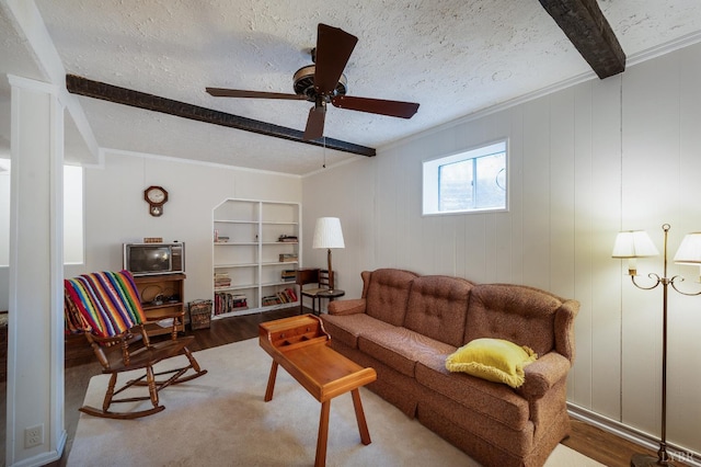 313 Robin Dr, Lynchburg, VA 24502 - living room with wood finished floors, beamed ceiling, ceiling fan, ornamental molding, and a textured ceiling