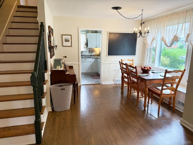 1309 Cherokee Ave, Lynchburg, VA 24502 - dining room with stairs, dark wood-style flooring, and a chandelier