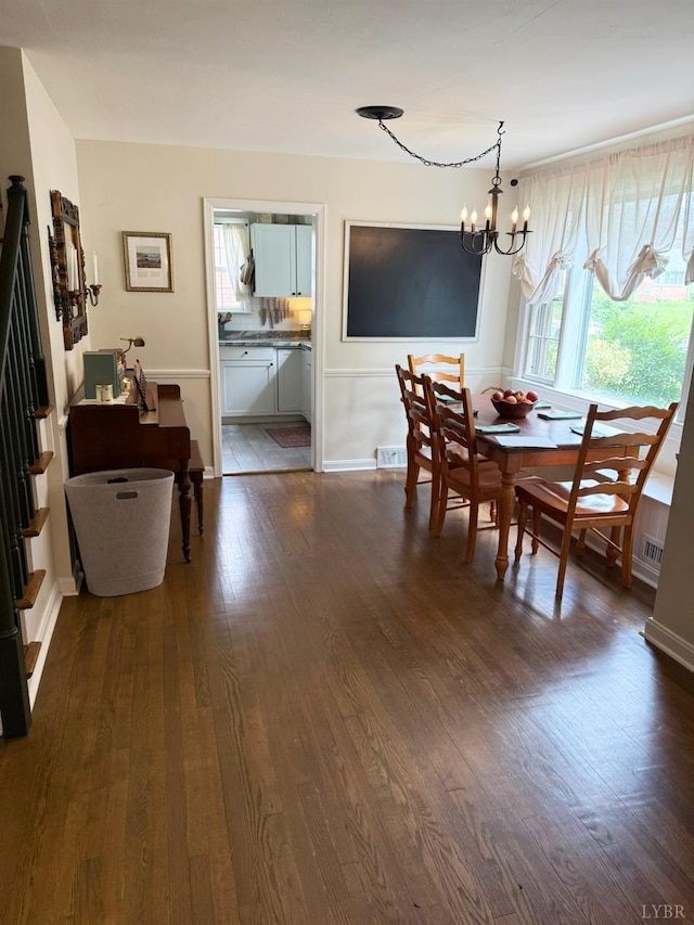 1309 Cherokee Ave, Lynchburg, VA 24502 - dining space featuring a chandelier and dark wood-style floors