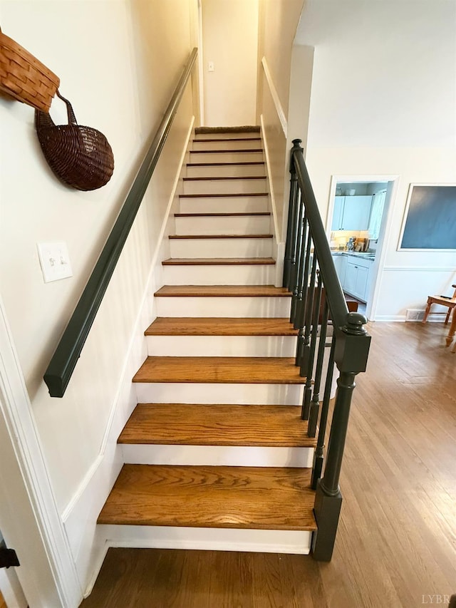 1309 Cherokee Ave, Lynchburg, VA 24502 - stairs featuring wood finished floors and a decorative wall