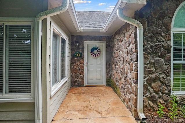 158 Salisbury Cir, Lynchburg, VA 24502 - doorway to property featuring stone siding and roof with shingles