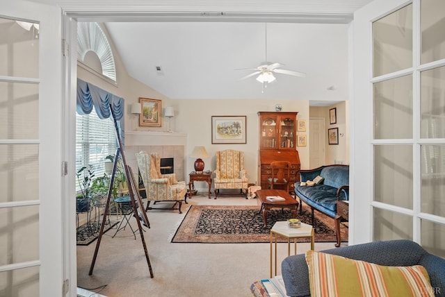 158 Salisbury Cir, Lynchburg, VA 24502 - living area featuring carpet, a tiled fireplace, ceiling fan, and high vaulted ceiling