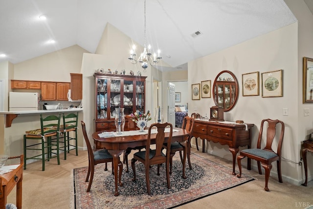 158 Salisbury Cir, Lynchburg, VA 24502 - dining room with lofted ceiling, light colored carpet, and a chandelier