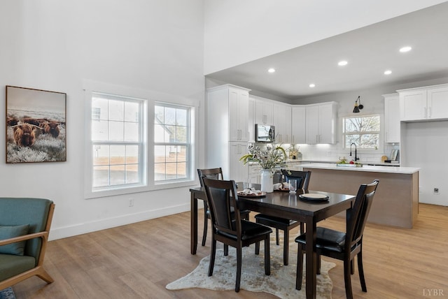 217 Stonegate Way, Danville, VA 24541 - dining space with recessed lighting, light wood-type flooring, and a high ceiling