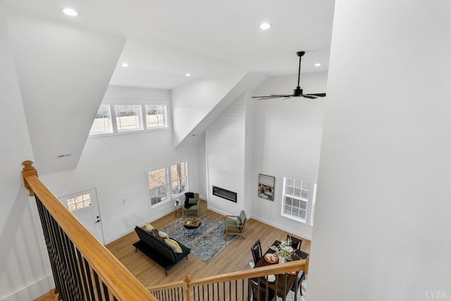 217 Stonegate Way, Danville, VA 24541 - living area with high vaulted ceiling, recessed lighting, wood finished floors, a large fireplace, and a ceiling fan