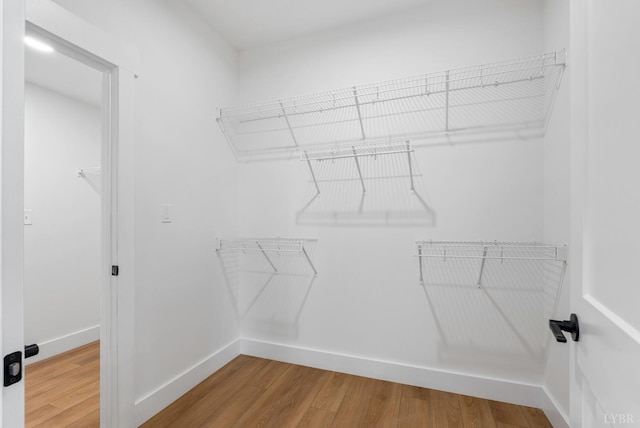217 Stonegate Way, Danville, VA 24541 - walk in closet featuring wood finished floors