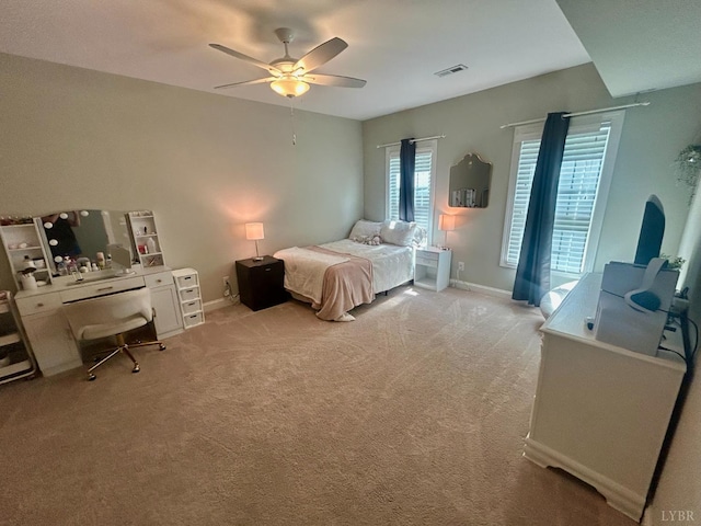 1481 Helmsdale Dr, Forest, VA 24551 - bedroom with an office area, light carpet, and ceiling fan
