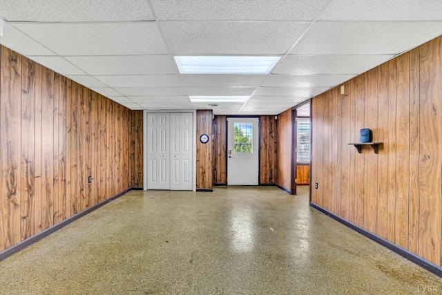 581 Ben Annie Rd, Gretna, VA 24557 - spare room with wood walls and a drop ceiling