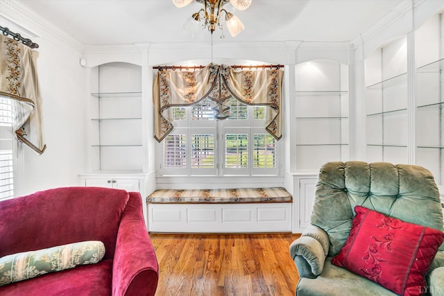 581 Ben Annie Rd, Gretna, VA 24557 - sitting room with crown molding, wood finished floors, and built in shelves