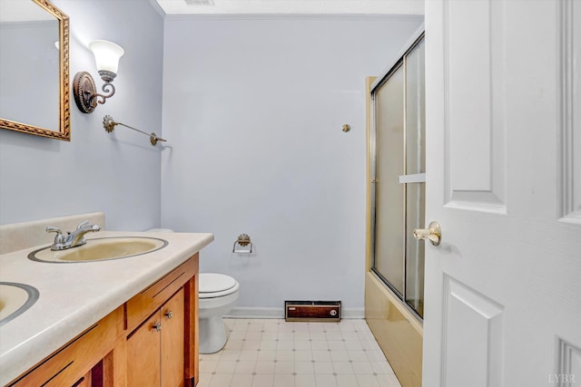 581 Ben Annie Rd, Gretna, VA 24557 - bathroom with double vanity, tile patterned floors, combined bath / shower with glass door, and crown molding