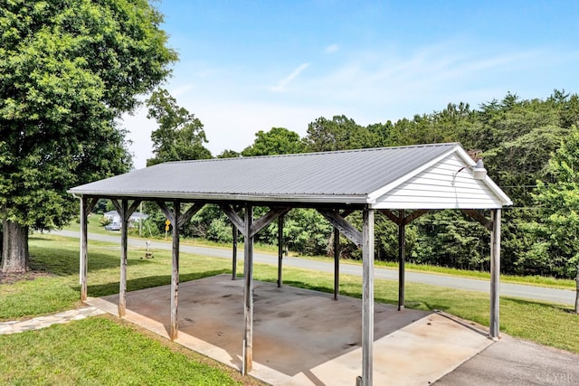 581 Ben Annie Rd, Gretna, VA 24557 - view of community with a lawn, a carport, and a patio area