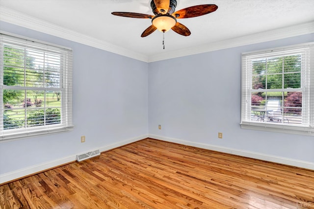 581 Ben Annie Rd, Gretna, VA 24557 - spare room featuring light wood-style floors, ceiling fan, and crown molding