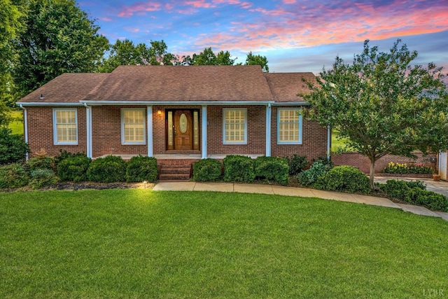 581 Ben Annie Rd, Gretna, VA 24557 - single story home featuring brick siding, a front yard, and covered porch