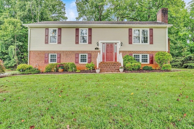 51 Laurel Ln, Lynchburg, VA 24502 - raised ranch with a chimney, brick siding, a front yard, and entry steps