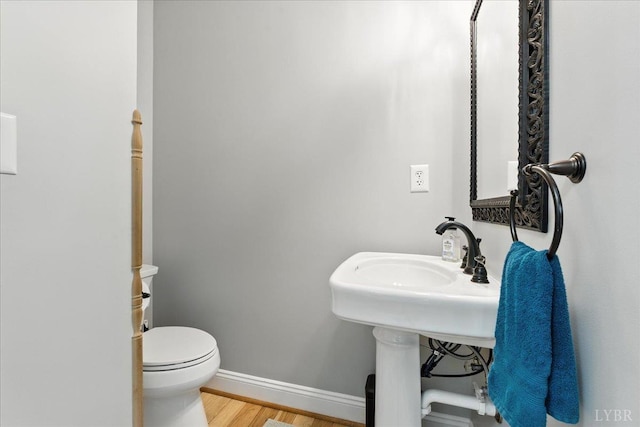 802 Lake Vista Dr, Forest, VA 24551 - half bathroom with wood finished floors and baseboards