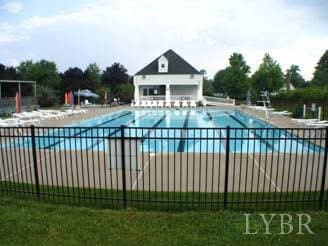 802 Lake Vista Dr, Forest, VA 24551 - community pool featuring a patio