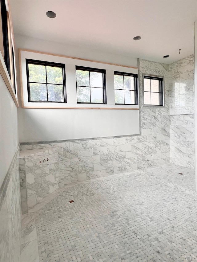 1608 Autumn Run Dr, Forest, VA 24551 - spare room featuring healthy amount of natural light, marble finish flooring, wainscoting, and recessed lighting