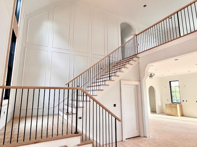 1608 Autumn Run Dr, Forest, VA 24551 - staircase with arched walkways and a decorative wall