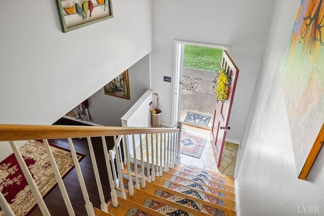 543 Dawnridge Dr, Lynchburg, VA 24502 - staircase featuring wood finished floors and a high ceiling