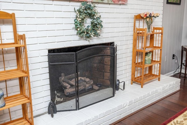 543 Dawnridge Dr, Lynchburg, VA 24502 - detailed view of a brick fireplace and wood finished floors