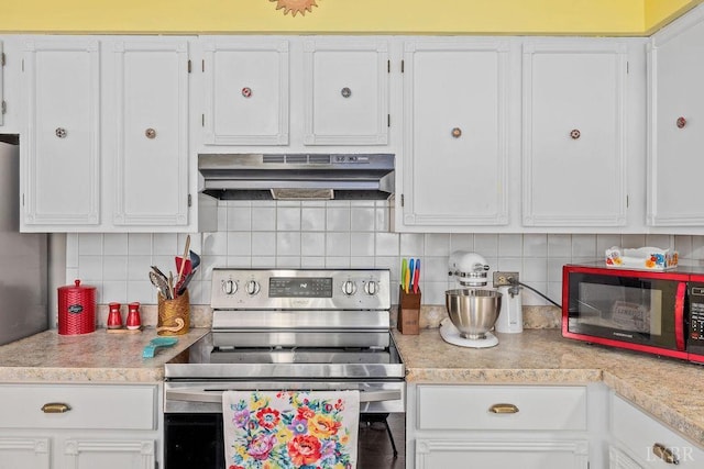 543 Dawnridge Dr, Lynchburg, VA 24502 - kitchen with stainless steel electric range, under cabinet range hood, light countertops, and white cabinetry