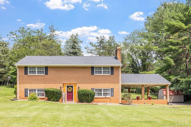 543 Dawnridge Dr, Lynchburg, VA 24502 - colonial home featuring a shed, a front yard, a chimney, and brick siding