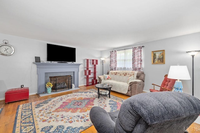 543 Dawnridge Dr, Lynchburg, VA 24502 - living room featuring a brick fireplace and wood finished floors