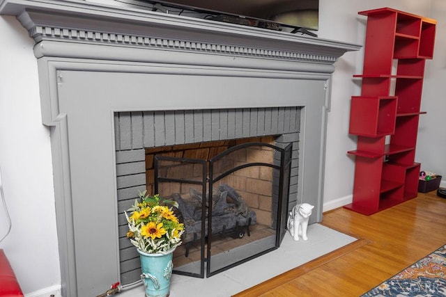 543 Dawnridge Dr, Lynchburg, VA 24502 - detailed view of a brick fireplace and wood finished floors