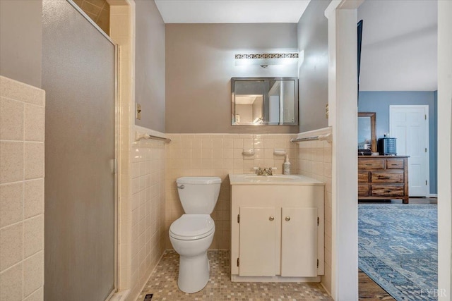 6032 Rhonda Rd, Lynchburg, VA 24502 - full bath featuring vanity, a stall shower, tile walls, and wainscoting