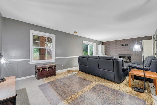 6032 Rhonda Rd, Lynchburg, VA 24502 - living area featuring carpet floors, a wainscoted wall, and a fireplace