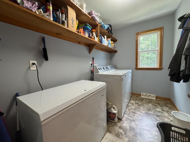 166 Dutch Ln, Appomattox, VA 24522 - laundry room featuring independent washer and dryer and stone finish floors