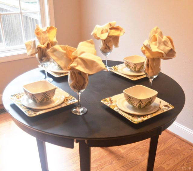 3600 Old Forest Rd Unit 113, Lynchburg, VA 24502 - dining space featuring plenty of natural light and wood finished floors