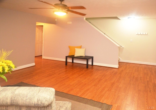 3600 Old Forest Rd Unit 113, Lynchburg, VA 24502 - living room featuring ceiling fan, light wood-style floors, and stairway