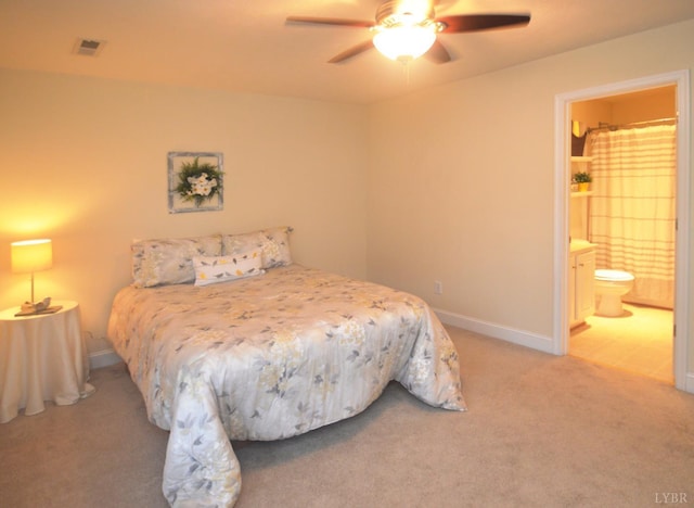 3600 Old Forest Rd Unit 113, Lynchburg, VA 24502 - bedroom with light colored carpet, ensuite bathroom, and a ceiling fan