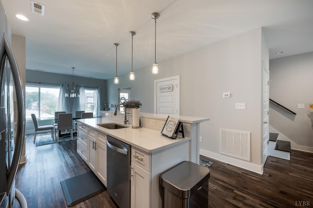 54 Allwell Rd, Lynchburg, VA 24502 - kitchen with dishwasher, white cabinets, dark wood-type flooring, fridge, and light countertops