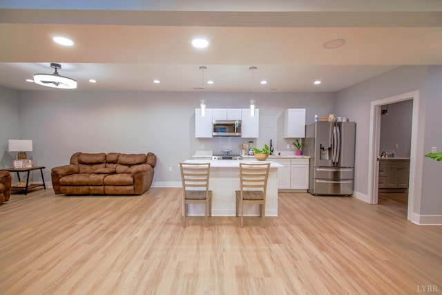 30 Patrick Ct, Madison Heights, VA 24572 - kitchen with stainless steel appliances, white cabinetry, recessed lighting, and light wood finished floors