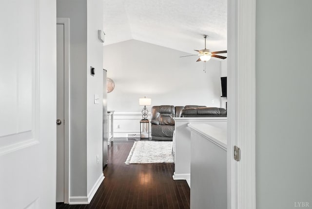 4086 Thomas Jefferson Rd, Forest, VA 24551 - corridor with lofted ceiling, dark wood-type flooring, and a textured ceiling