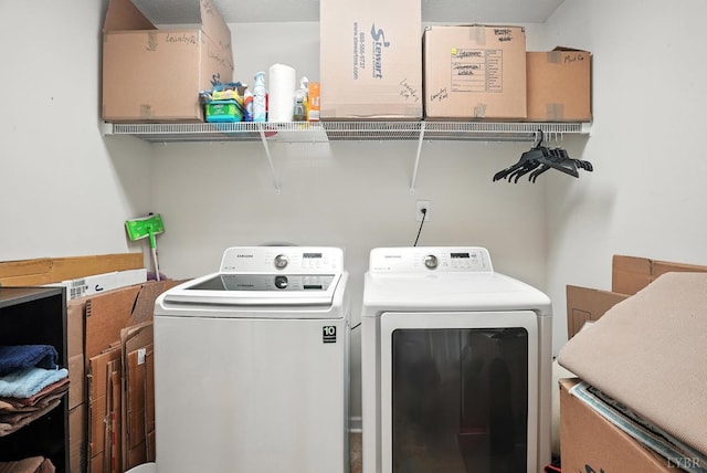 4086 Thomas Jefferson Rd, Forest, VA 24551 - laundry area with washer and clothes dryer and cabinet space