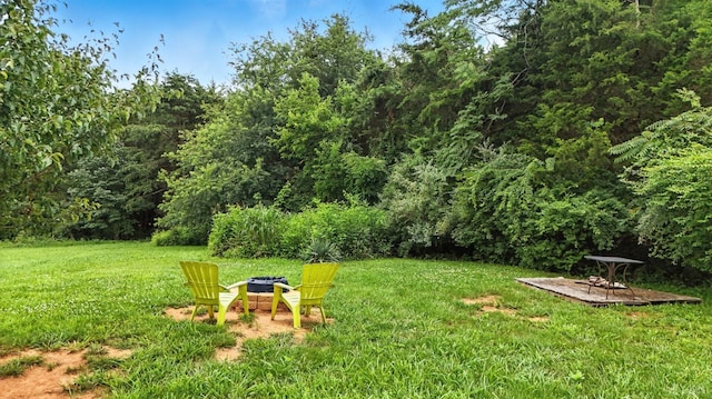 4086 Thomas Jefferson Rd, Forest, VA 24551 - view of grassy yard with an outdoor fire pit