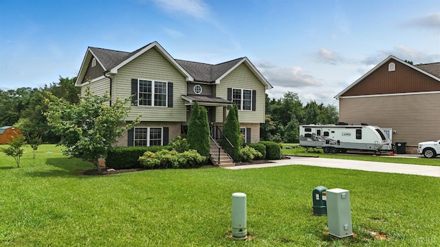 4086 Thomas Jefferson Rd, Forest, VA 24551 - split foyer home with brick siding, a front lawn, and a shingled roof