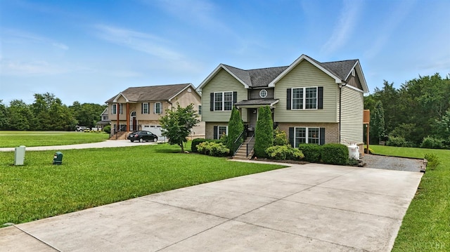 4086 Thomas Jefferson Rd, Forest, VA 24551 - raised ranch featuring driveway, a front lawn, brick siding, and stairs