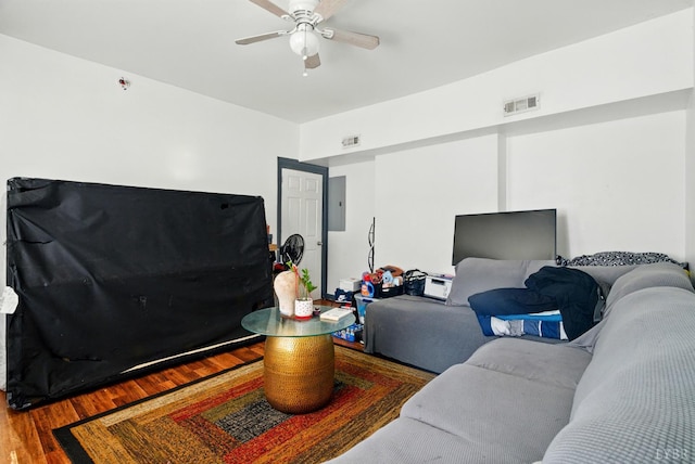 714 Madison St, Lynchburg, VA 24504 - living area with electric panel, wood finished floors, and ceiling fan