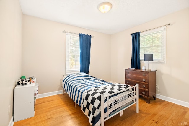 1853 Rainbow Forest Dr, Lynchburg, VA 24502 - bedroom featuring multiple windows and light wood finished floors