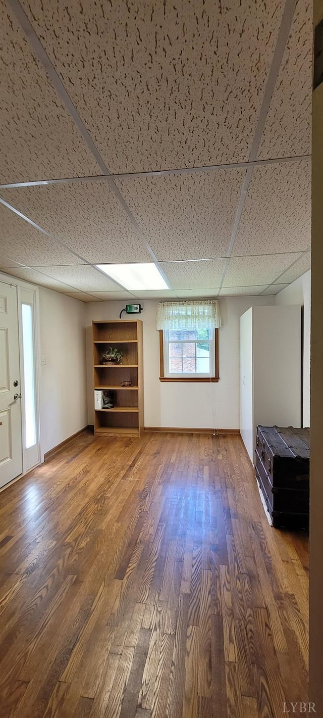 1769 Izaak Walton Rd, Madison Heights, VA 24572 - unfurnished living room with wood finished floors and a drop ceiling