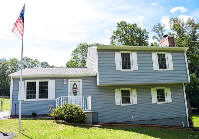 1769 Izaak Walton Rd, Madison Heights, VA 24572 - split level home with a chimney, crawl space, and a front lawn