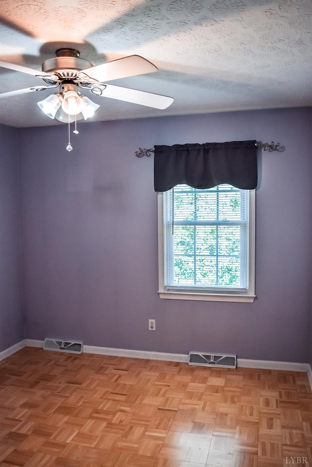 1769 Izaak Walton Rd, Madison Heights, VA 24572 - unfurnished room featuring a ceiling fan and a textured ceiling