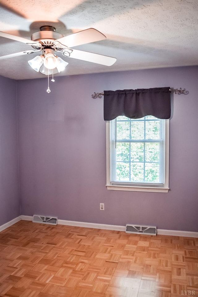 1769 Izaak Walton Rd, Madison Heights, VA 24572 - empty room with a ceiling fan and a textured ceiling