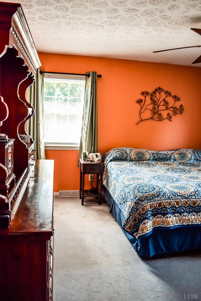1769 Izaak Walton Rd, Madison Heights, VA 24572 - carpeted bedroom featuring a textured ceiling and ceiling fan