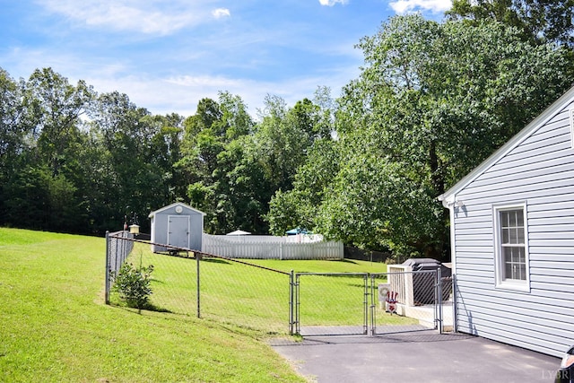 1769 Izaak Walton Rd, Madison Heights, VA 24572 - view of yard featuring a gate and a storage shed