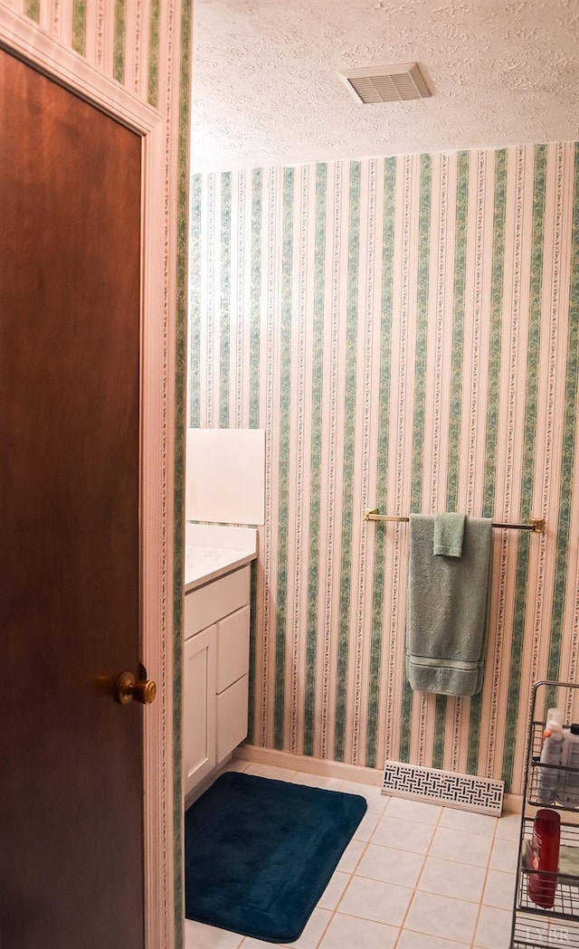 1769 Izaak Walton Rd, Madison Heights, VA 24572 - bathroom with tile patterned floors, vanity, and a textured ceiling